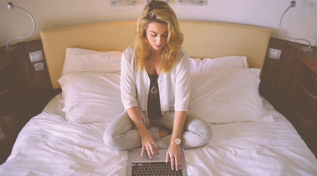 financial wellness after divorce woman on computer