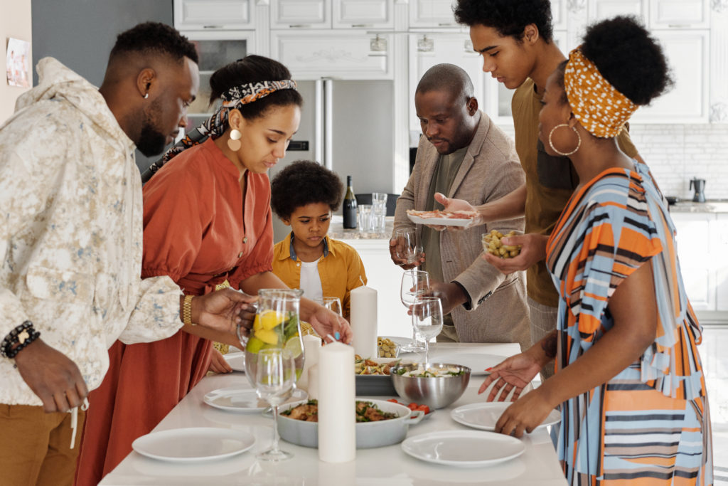 family getting ready to eat together