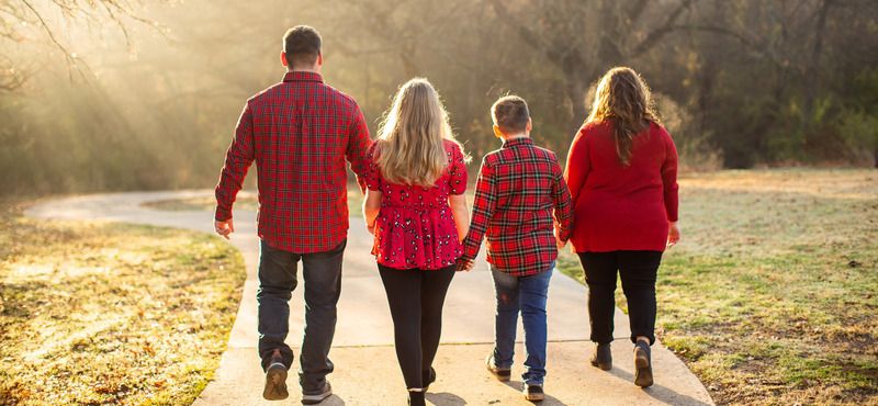 family on a pathway