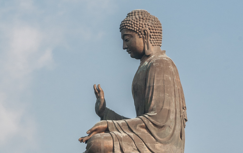 buddha pointing to east