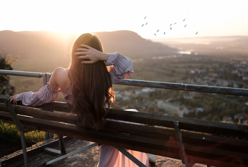 Canva - Woman Watching a Sunset