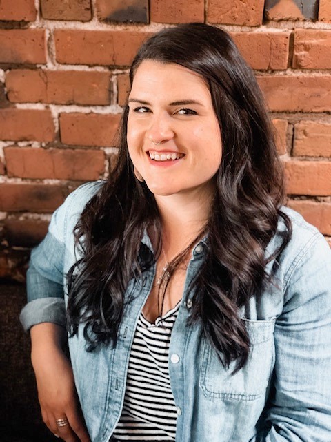 RSMP Headshot young woman in front of bricks