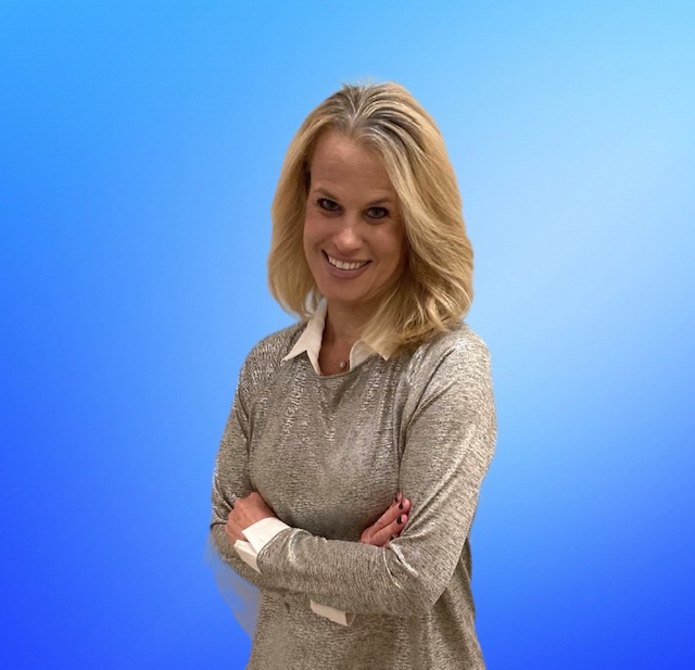 blonde woman with blue background