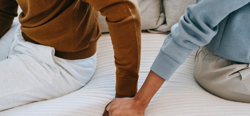 pexels-alex-green-5700177 divorcing couples with hands touching